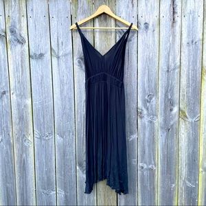 Shin-length black Grecian-style dress